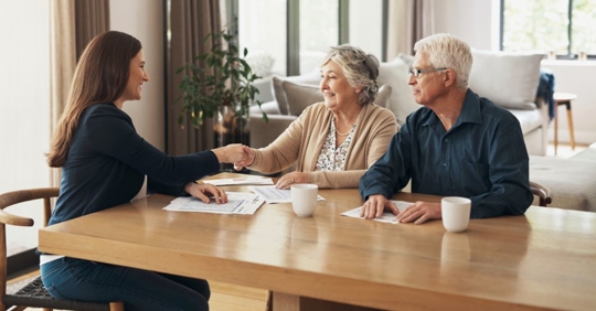 Financial advisor meeting with couple who is working on their estate plan